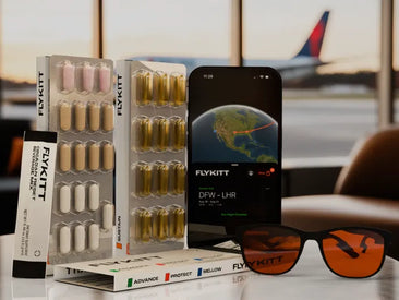 FlyKitt jet lag supplements, sunglasses, and mobile app displayed at an airport lounge.